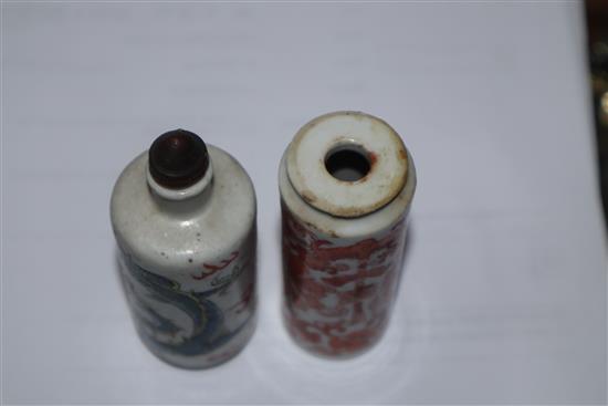 Two 19th century Chinese porcelain cylindrical snuff bottles tallest 8cm